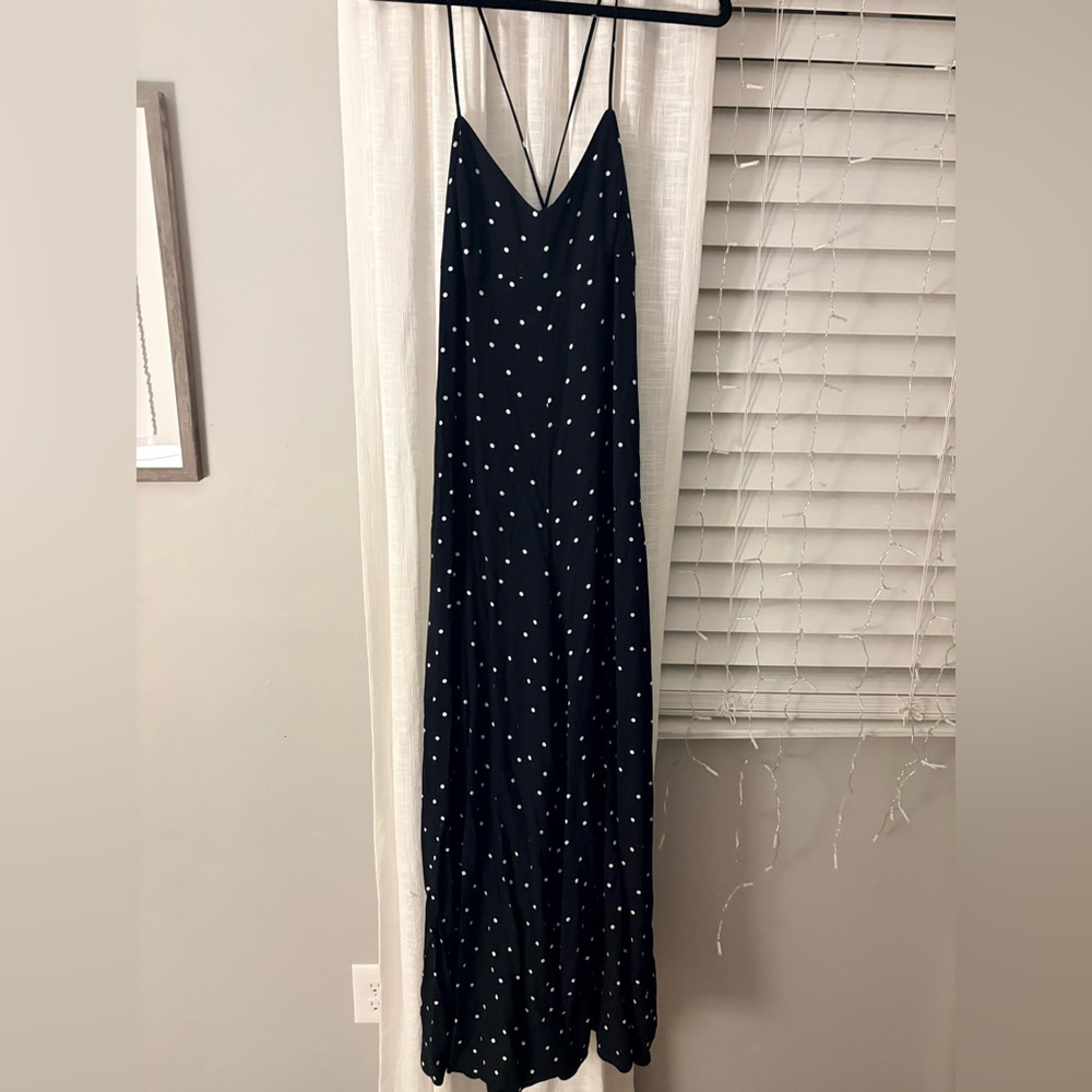 Free People Summer Jamboree black and white polka dot wide leg jumpsuit. Size S.